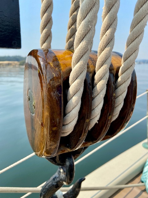 Wooden boat gleams in the sun